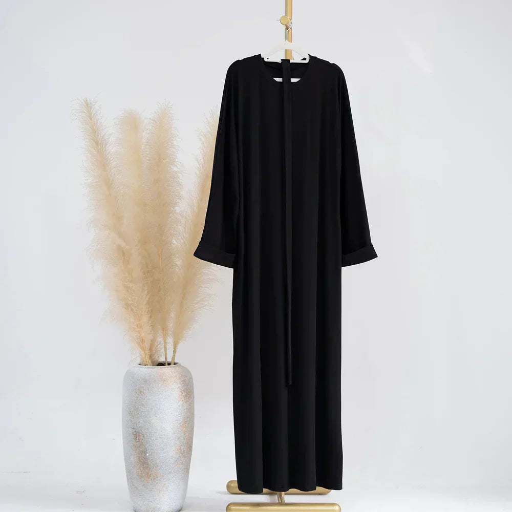 Ariane - Abaya tricotée élégante avec ceinture et poches latérales