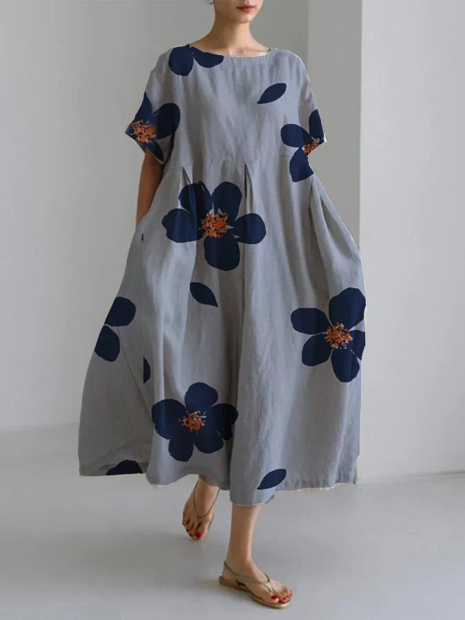 RAFFAELLA | Longue robe florale à la coupe décontractée et aux détails élégants pour les journées chic