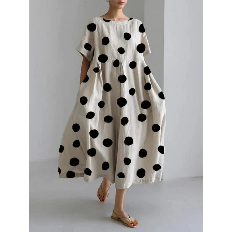 VALENTINA | Robe longue décontractée à pois iconiques et liberté de mouvement pour les journées d'été